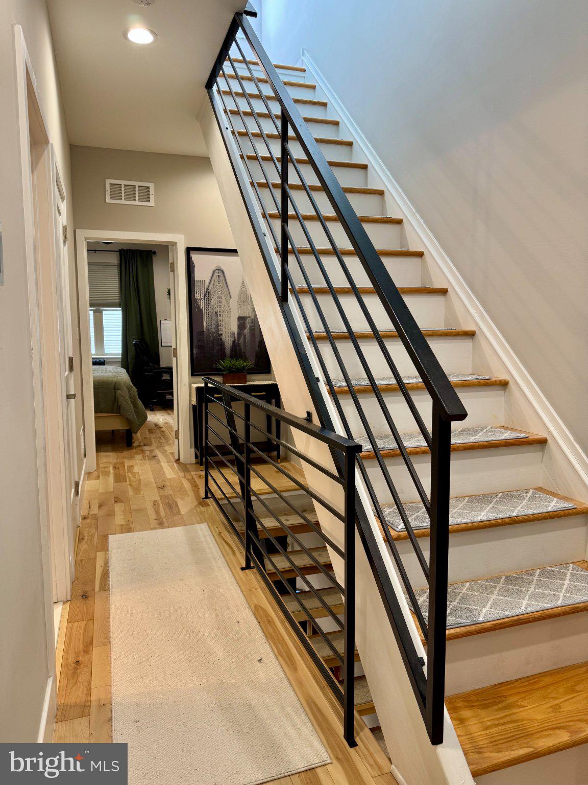 1217 LeCount Street Philadelphia, PA 19121 - Photo 23 of 29 Modern staircase with sleek railings.