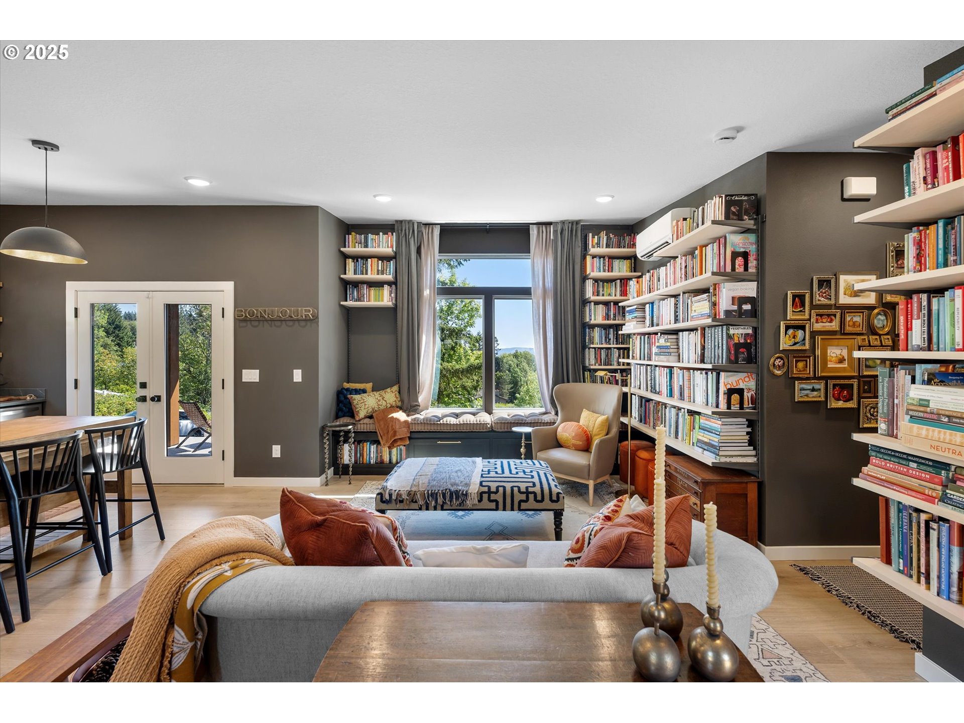 810 Taylor Road Kalama, WA 98625 - Photo 11 of 35 a living room with furniture and a book shelf