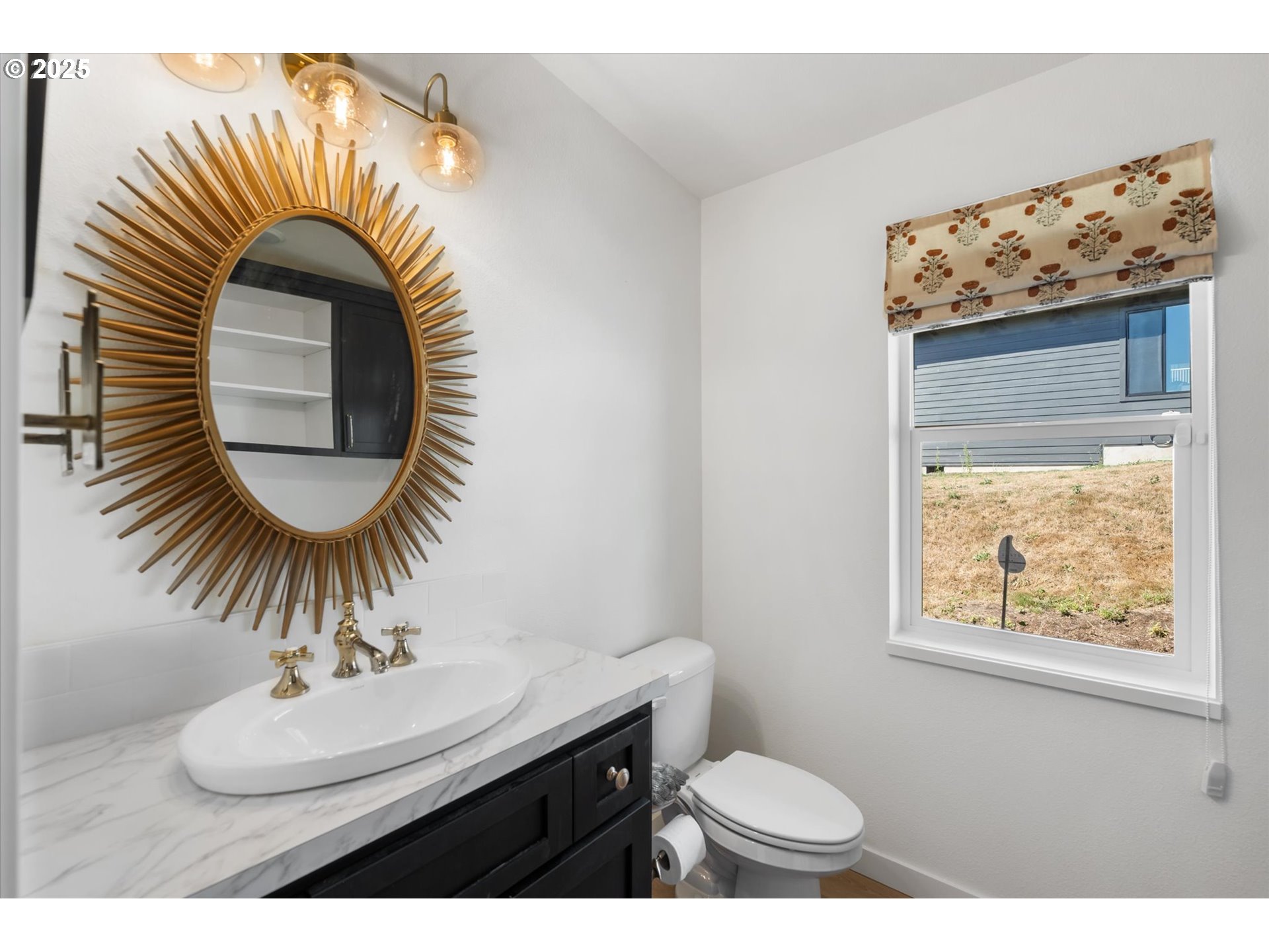 810 Taylor Road Kalama, WA 98625 - Photo 15 of 35 a bathroom with a sink mirror vanity and toilet
