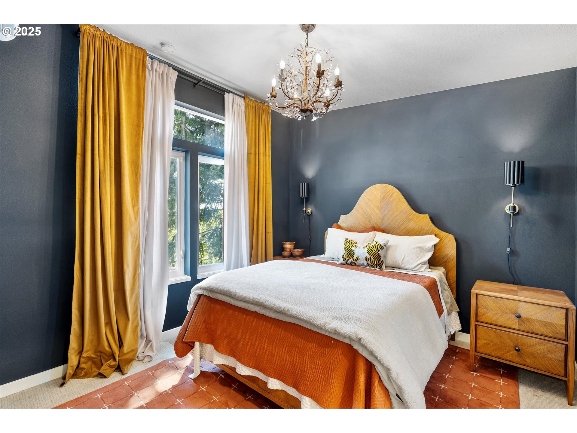 810 Taylor Road Kalama, WA 98625 - Photo 20 of 35 a bedroom with a bed and a chandelier