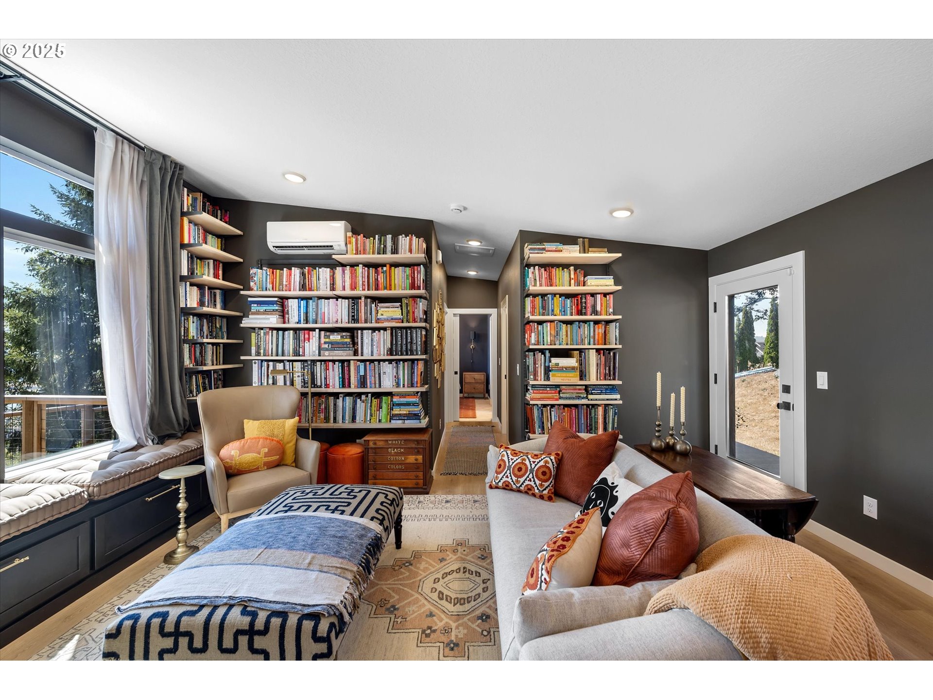 810 Taylor Road Kalama, WA 98625 - Photo 9 of 35 a living room with furniture and a bookshelf