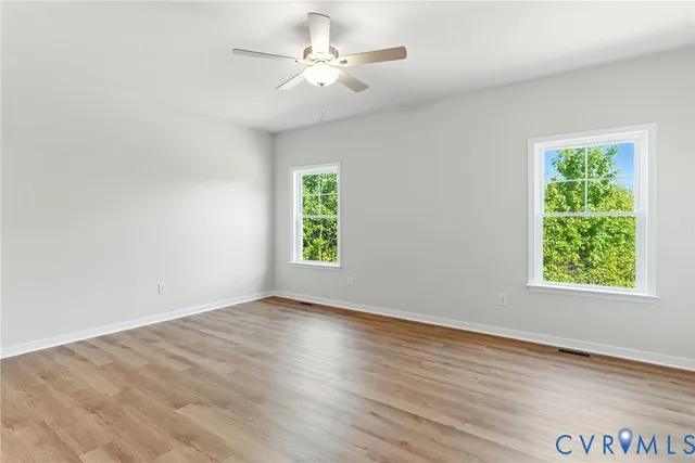 a bathroom with a double vanity sink and mirror