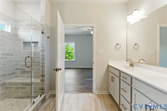 a view of storage and utility room with closet