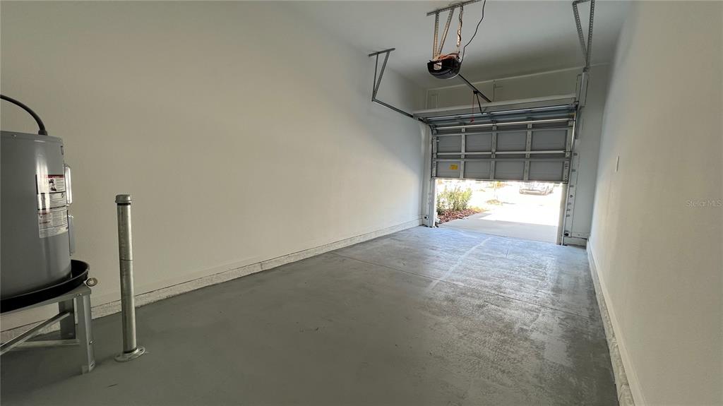 2396 Brook Marsh Loop Kissimmee, FL 34747 - Photo 14 of 29 a view of empty room with wooden floor