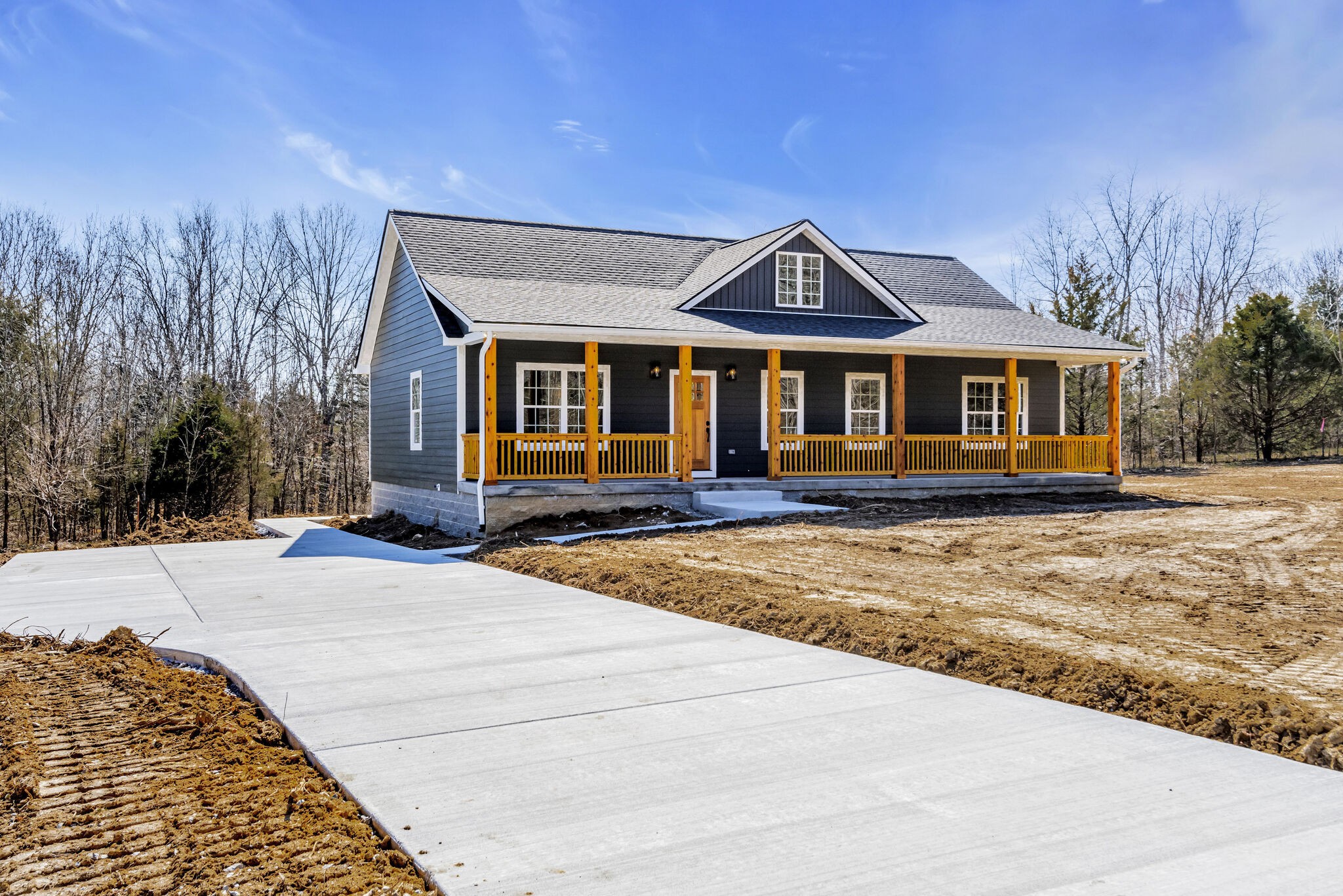 8330 New Bethel Road Lyles, TN 37098 - Photo 2 of 33 a front view of a house with a yard