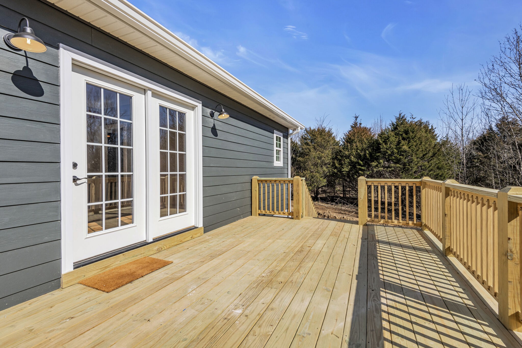 8330 New Bethel Road Lyles, TN 37098 - Photo 28 of 33 a view of a balcony with wooden floor and fence