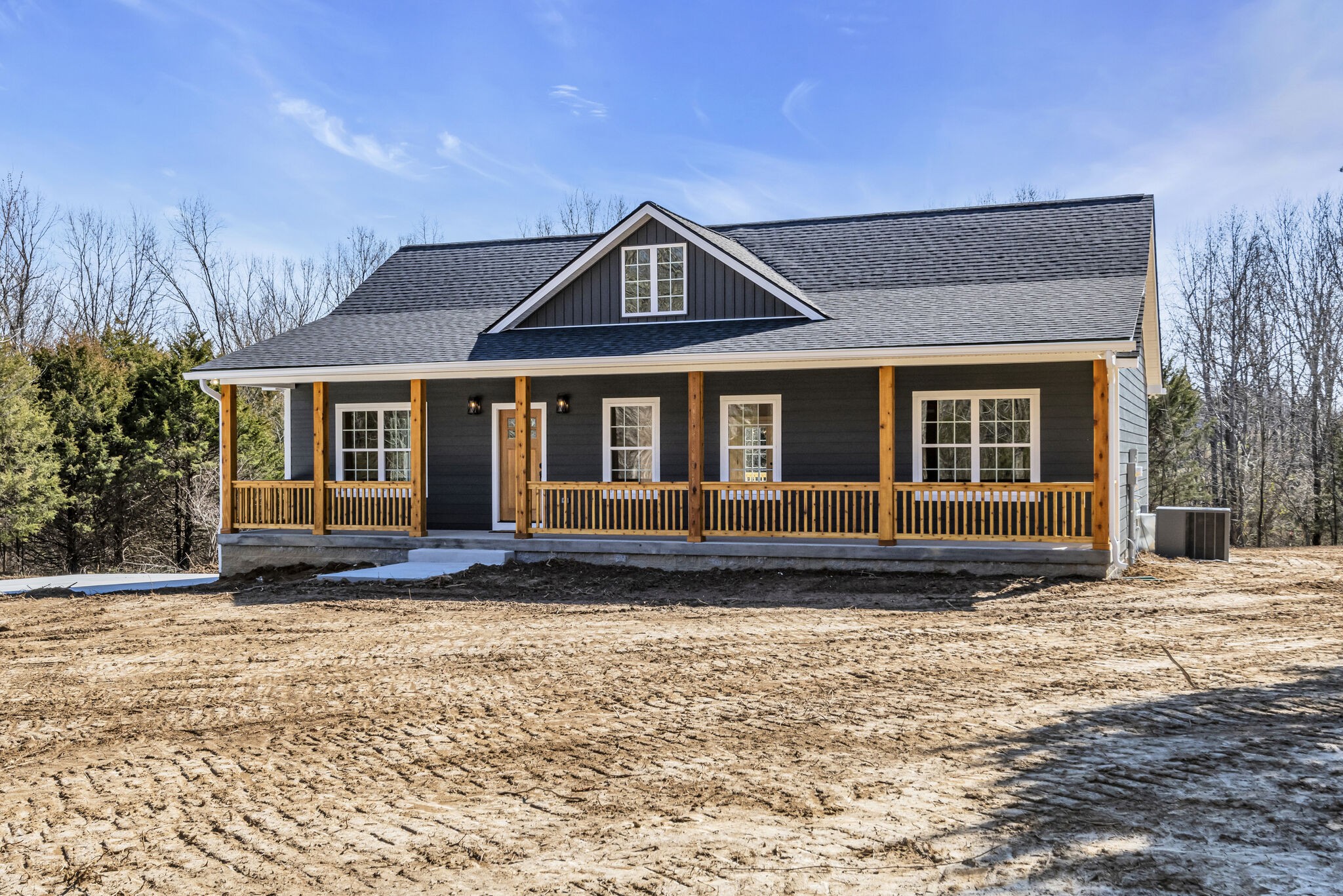 8330 New Bethel Road Lyles, TN 37098 - Photo 4 of 33 a front view of a house with a yard