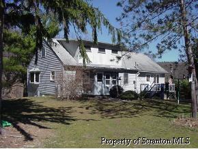70 R R Falls, PA 18615 - Photo 5 of 5 a front view of a house with a yard