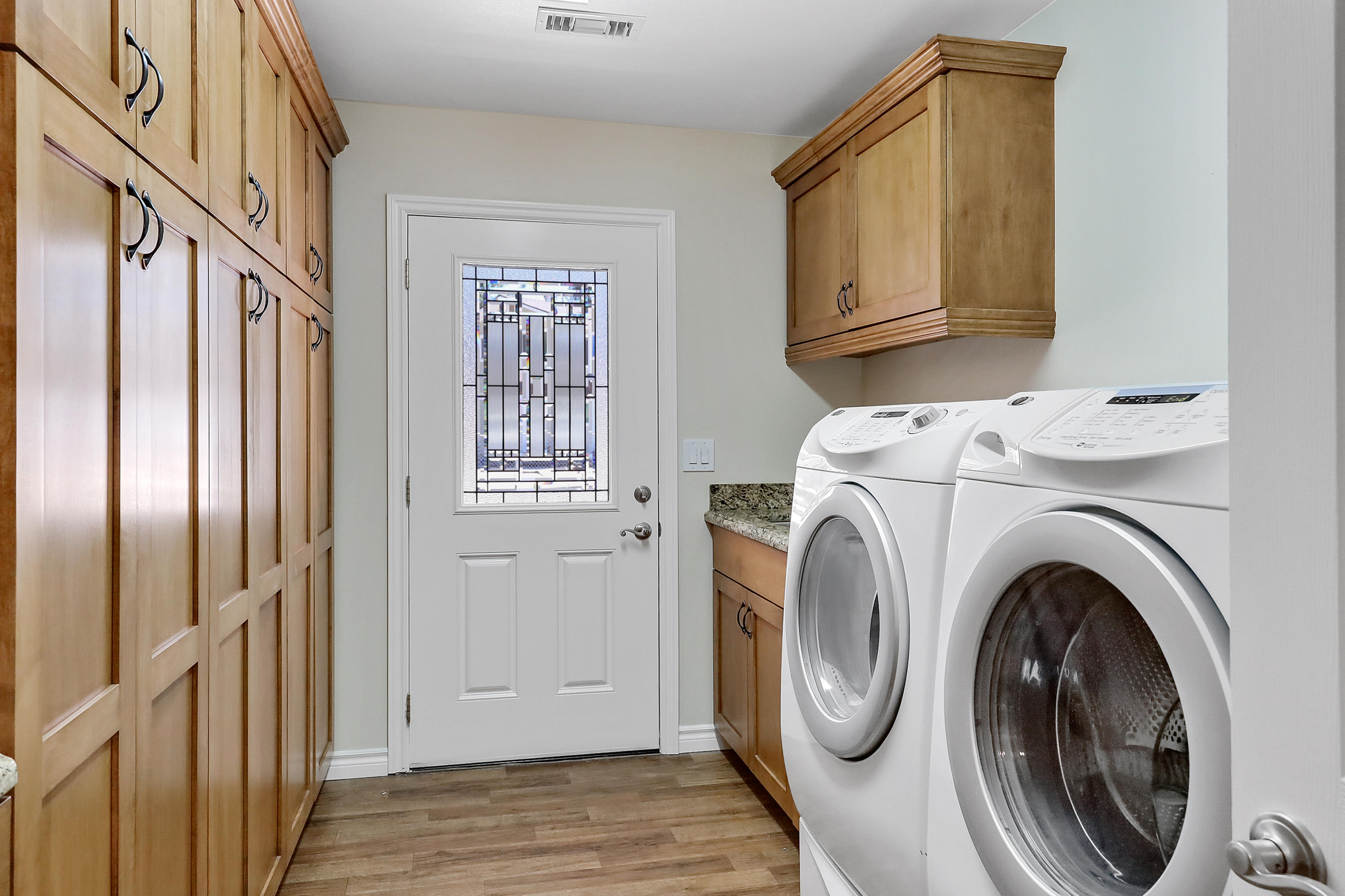 36211 Tool Box Spring Road Mountain Center, CA 92561 - Photo 14 of 26 a view of washer and dryer with bathroom in the background