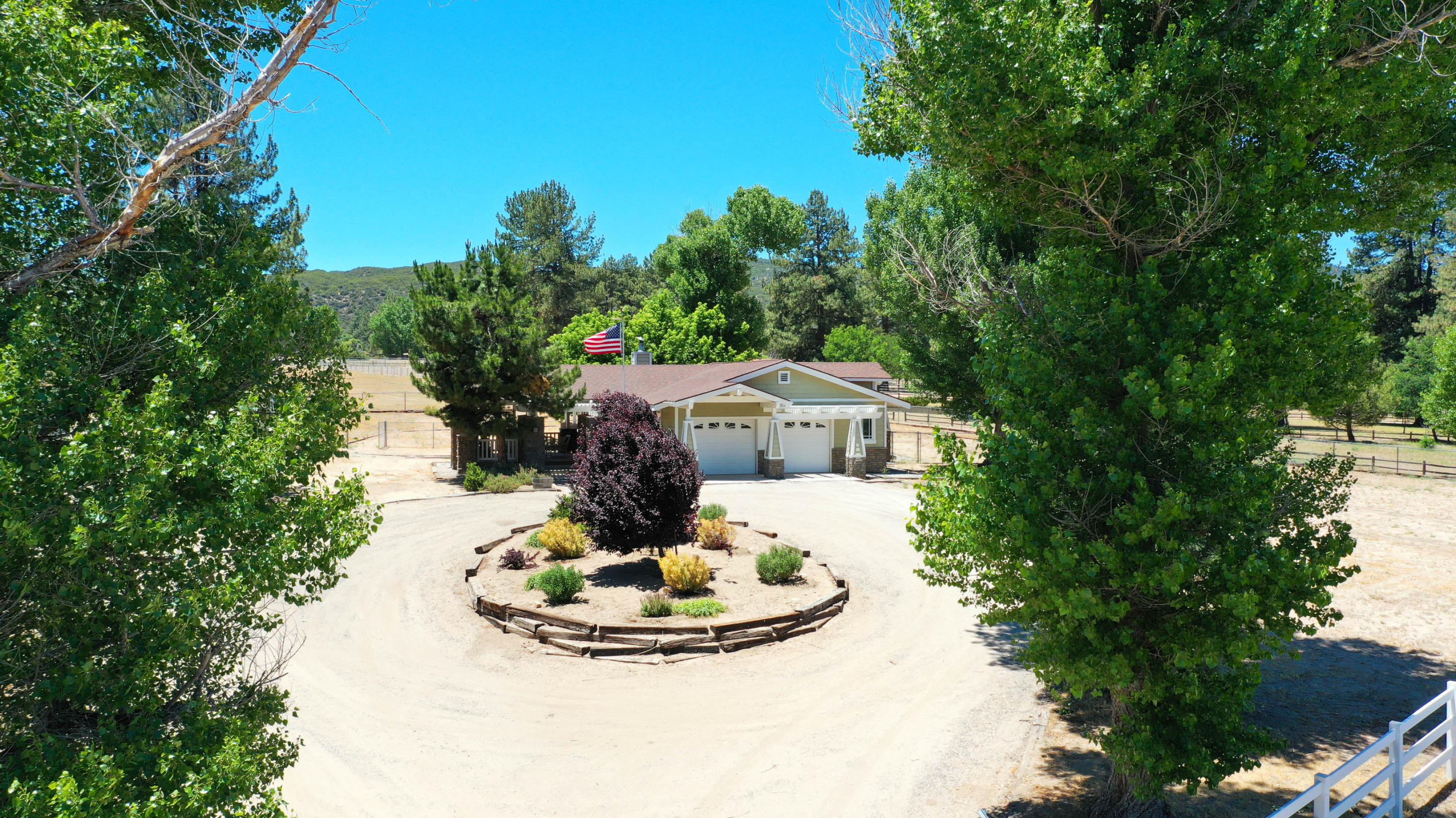 36211 Tool Box Spring Road Mountain Center, CA 92561 - Photo 25 of 26 a view of a house with a yard fire pit