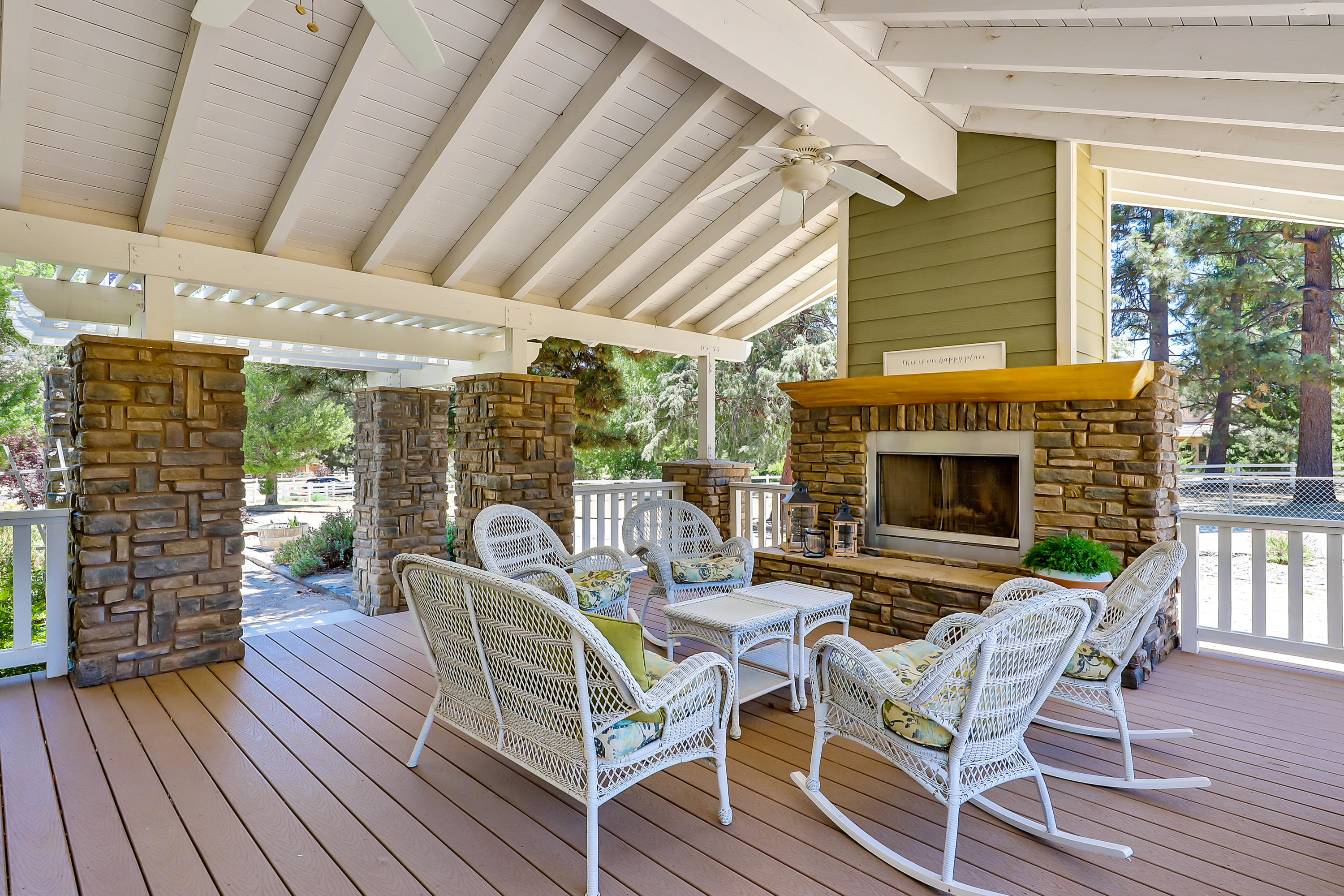 36211 Tool Box Spring Road Mountain Center, CA 92561 - Photo 4 of 26 a patio with table and chairs and potted plants
