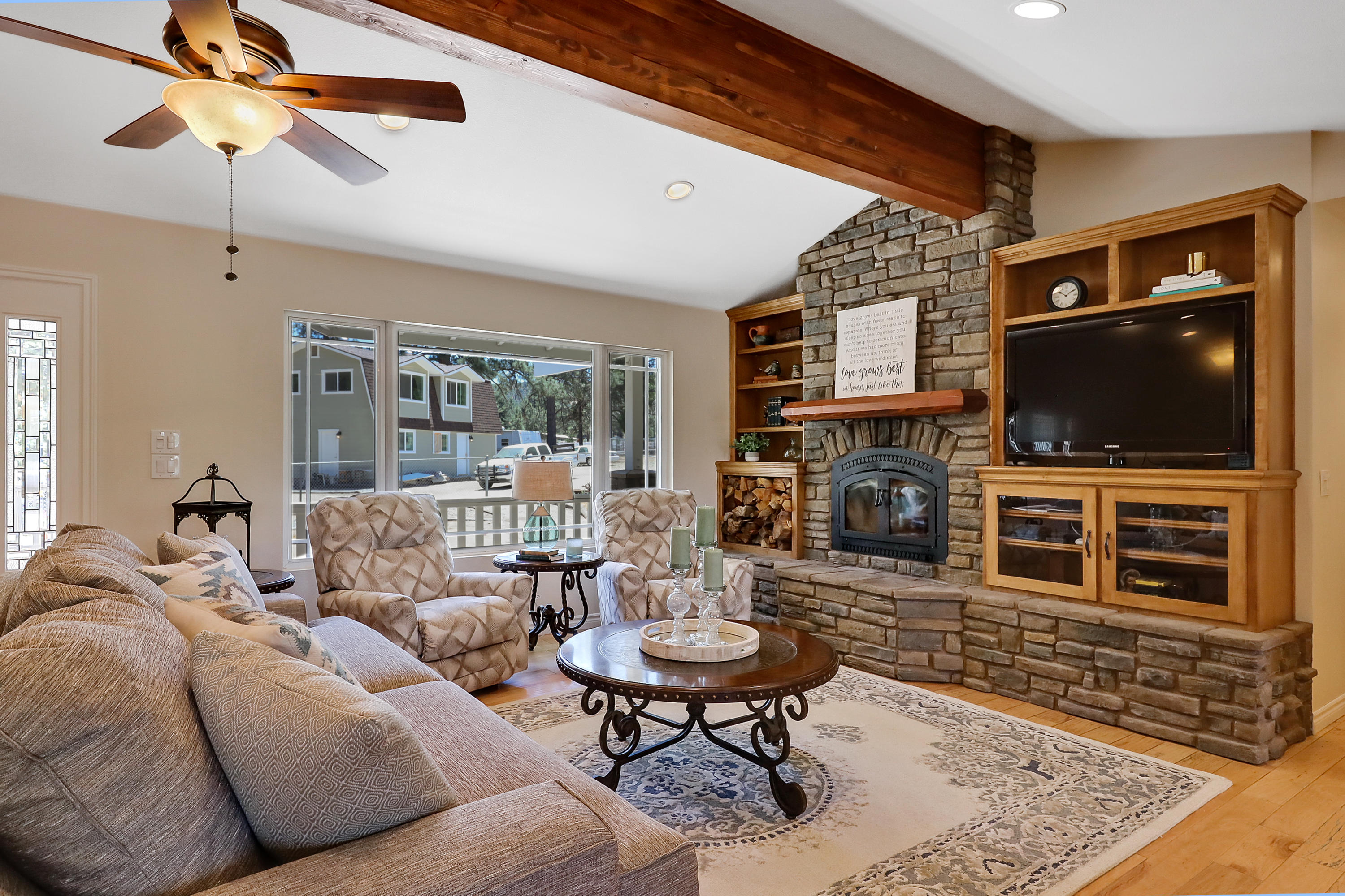 36211 Tool Box Spring Road Mountain Center, CA 92561 - Photo 7 of 26 a living room with furniture and a flat screen tv