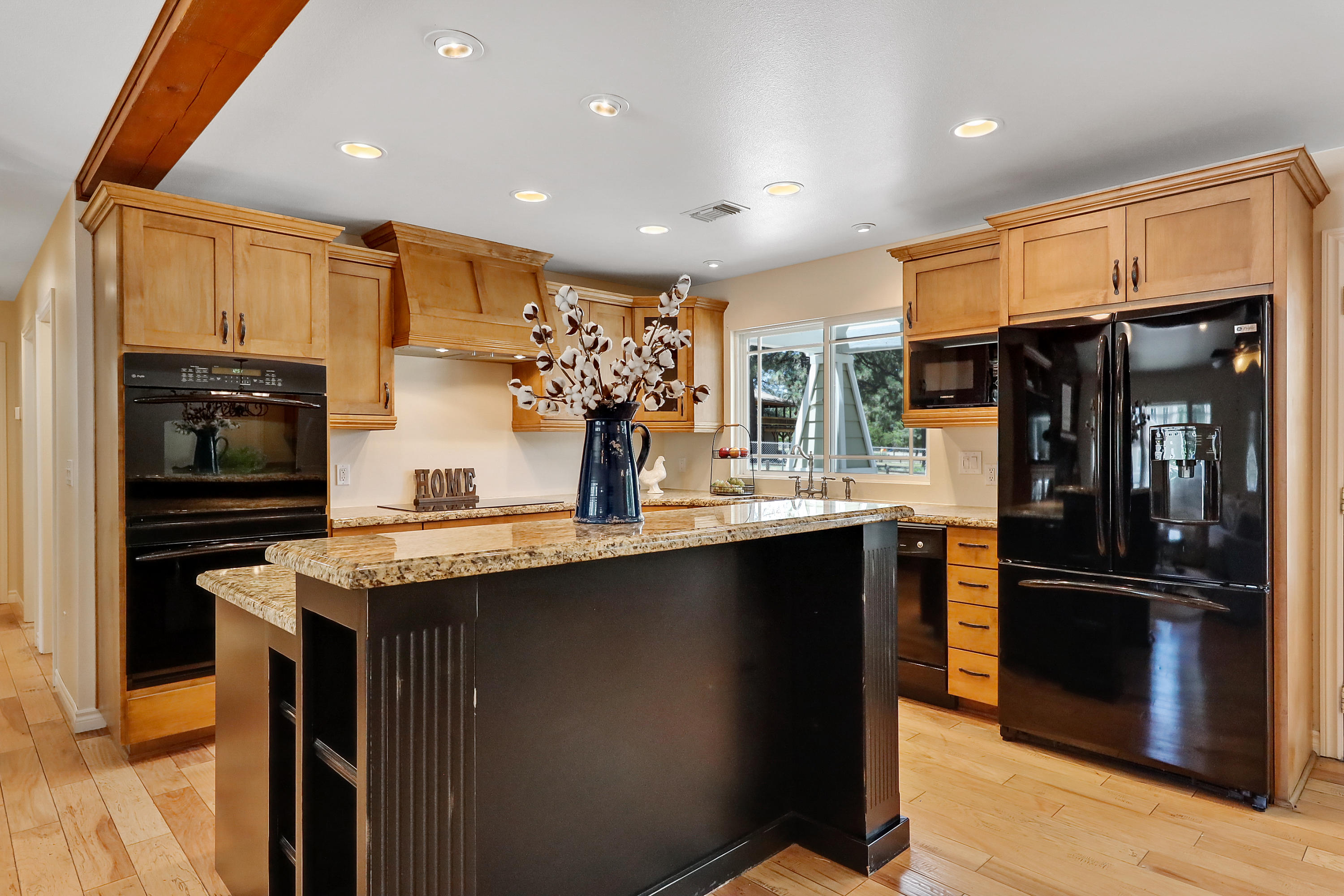 36211 Tool Box Spring Road Mountain Center, CA 92561 - Photo 10 of 26 a kitchen with stainless steel appliances granite countertop a refrigerator a sink and a stove