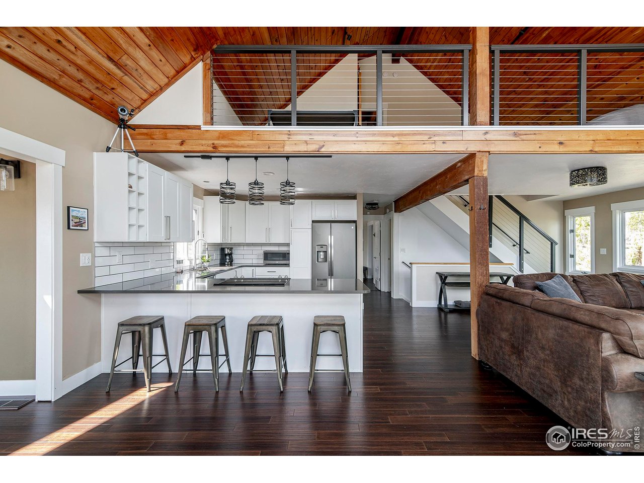 61 County Road 8501 Tabernash, CO 80478 - Photo 13 of 38 Completely updated kitchen with white cabinets, grey quartz counter tops and stainless steel appliances