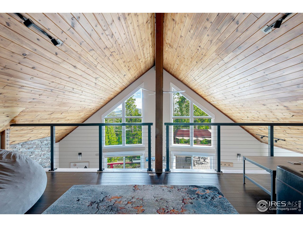61 County Road 8501 Tabernash, CO 80478 - Photo 20 of 38 Loft overlooks main living area with views of the mountains