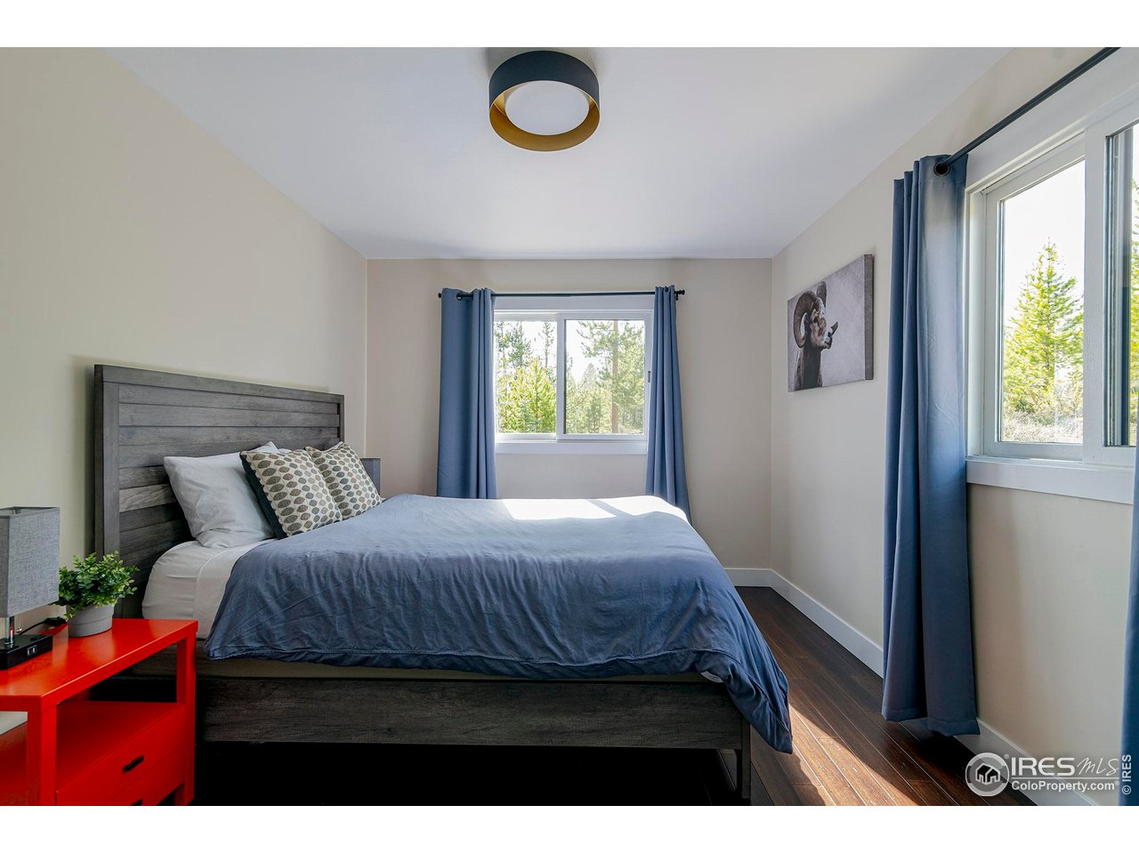 61 County Road 8501 Tabernash, CO 80478 - Photo 29 of 38 Bedroom 3 on the main level with hardwood floors