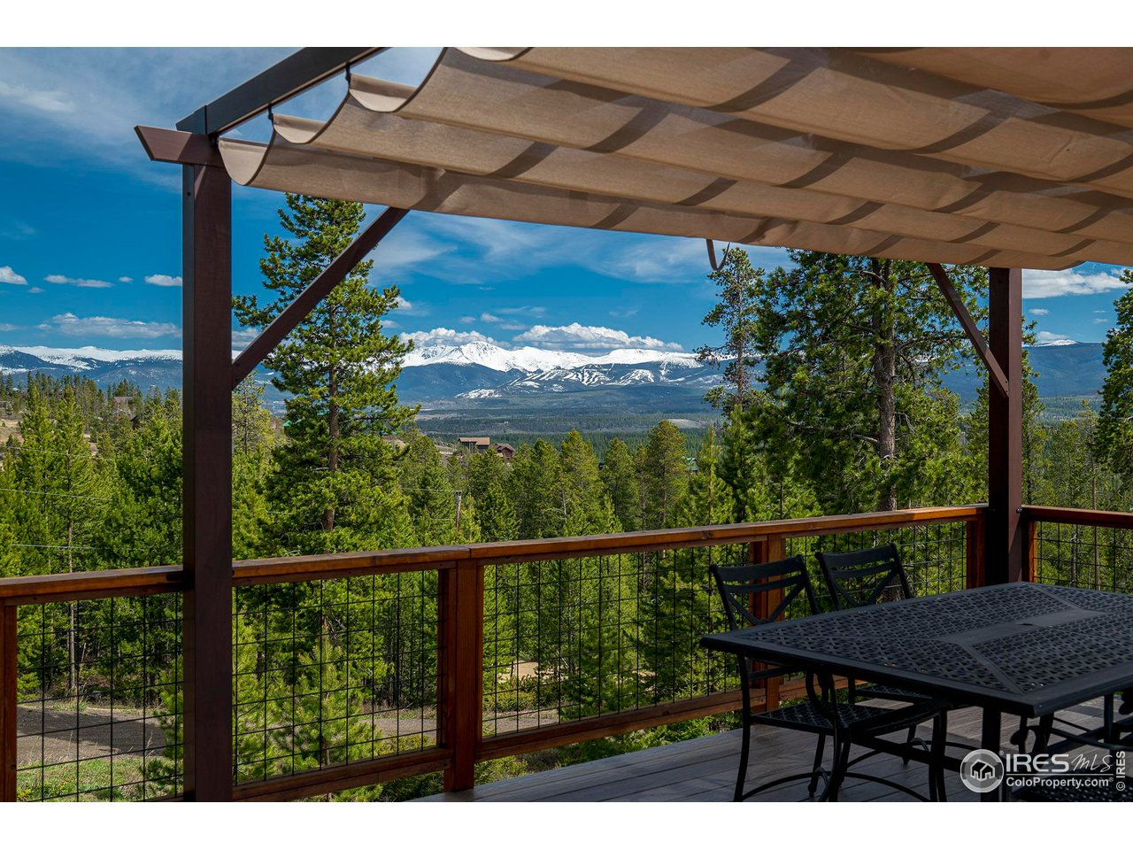 61 County Road 8501 Tabernash, CO 80478 - Photo 4 of 38 500+ sqft deck done with MoistureShield Cool Deck, which means human feet and dog paws are safe even in the middle of summer