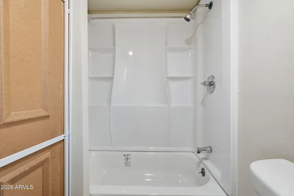 a bathroom with a bathtub