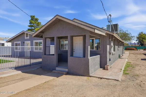 a front view of a house with a porch