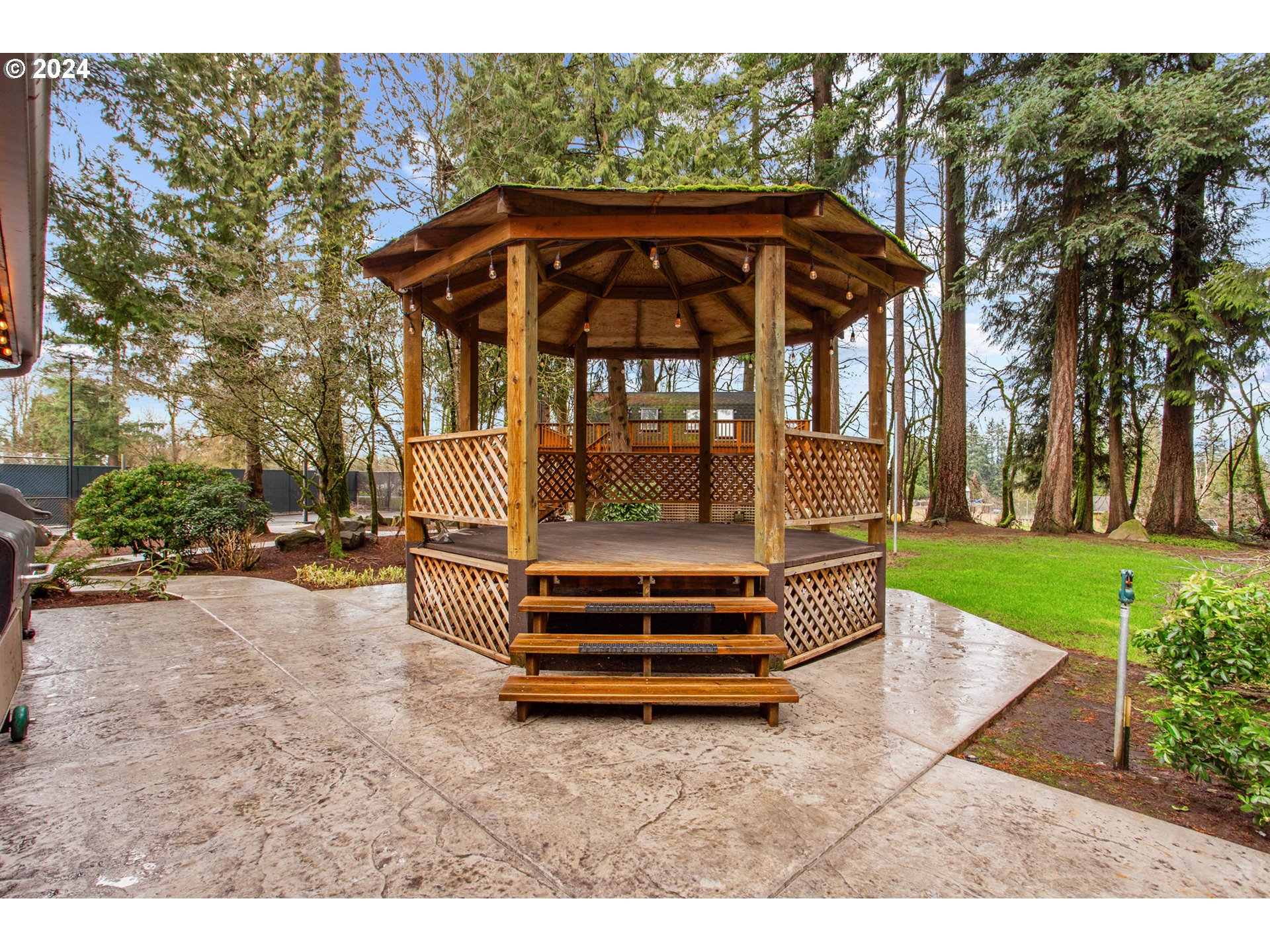 3308 Northwest 203rd Street Ridgefield, WA 98642 - Photo 11 of 41 a front view of a house with garden