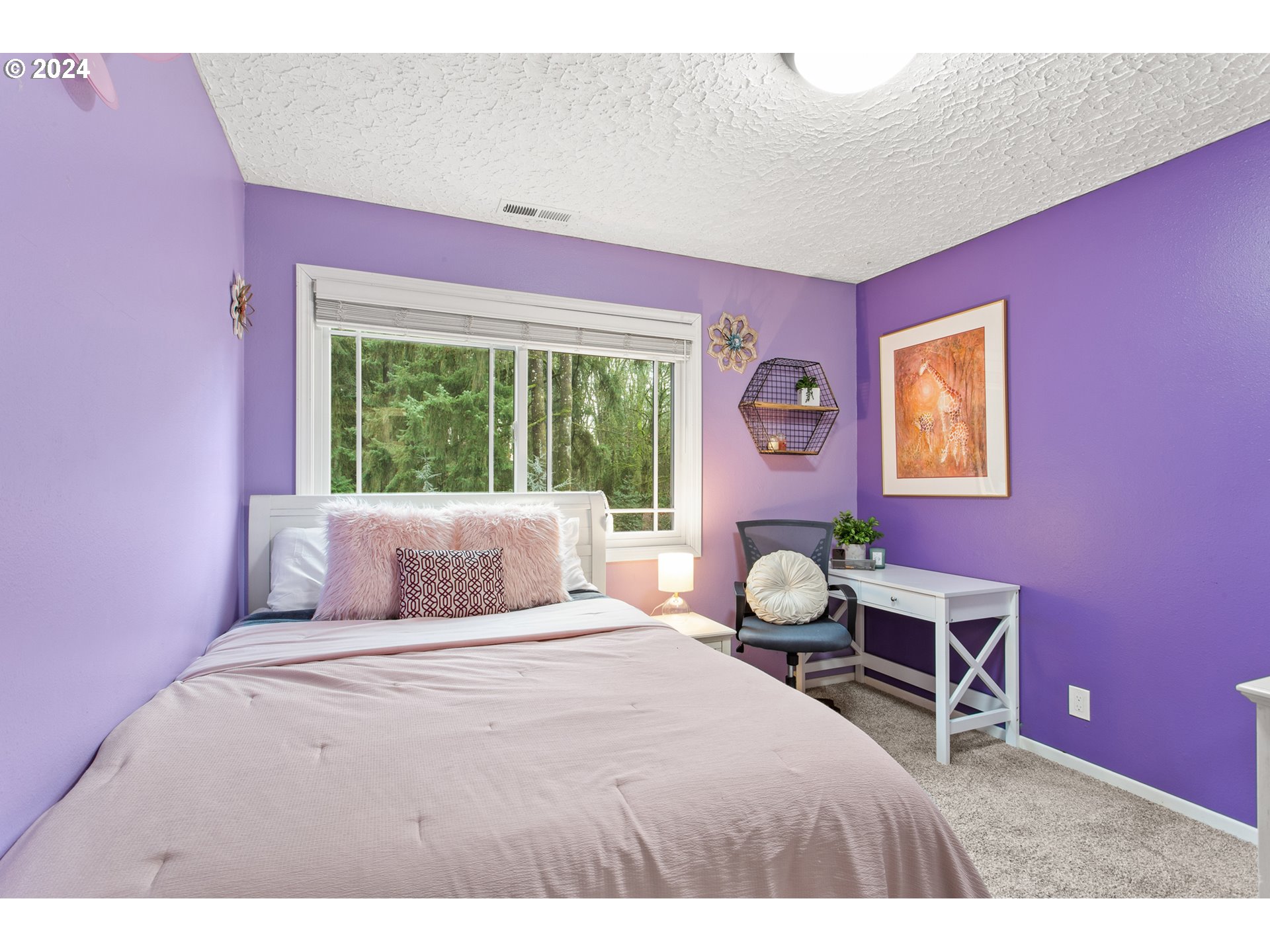 3308 Northwest 203rd Street Ridgefield, WA 98642 - Photo 21 of 41 a bedroom with a bed and chair
