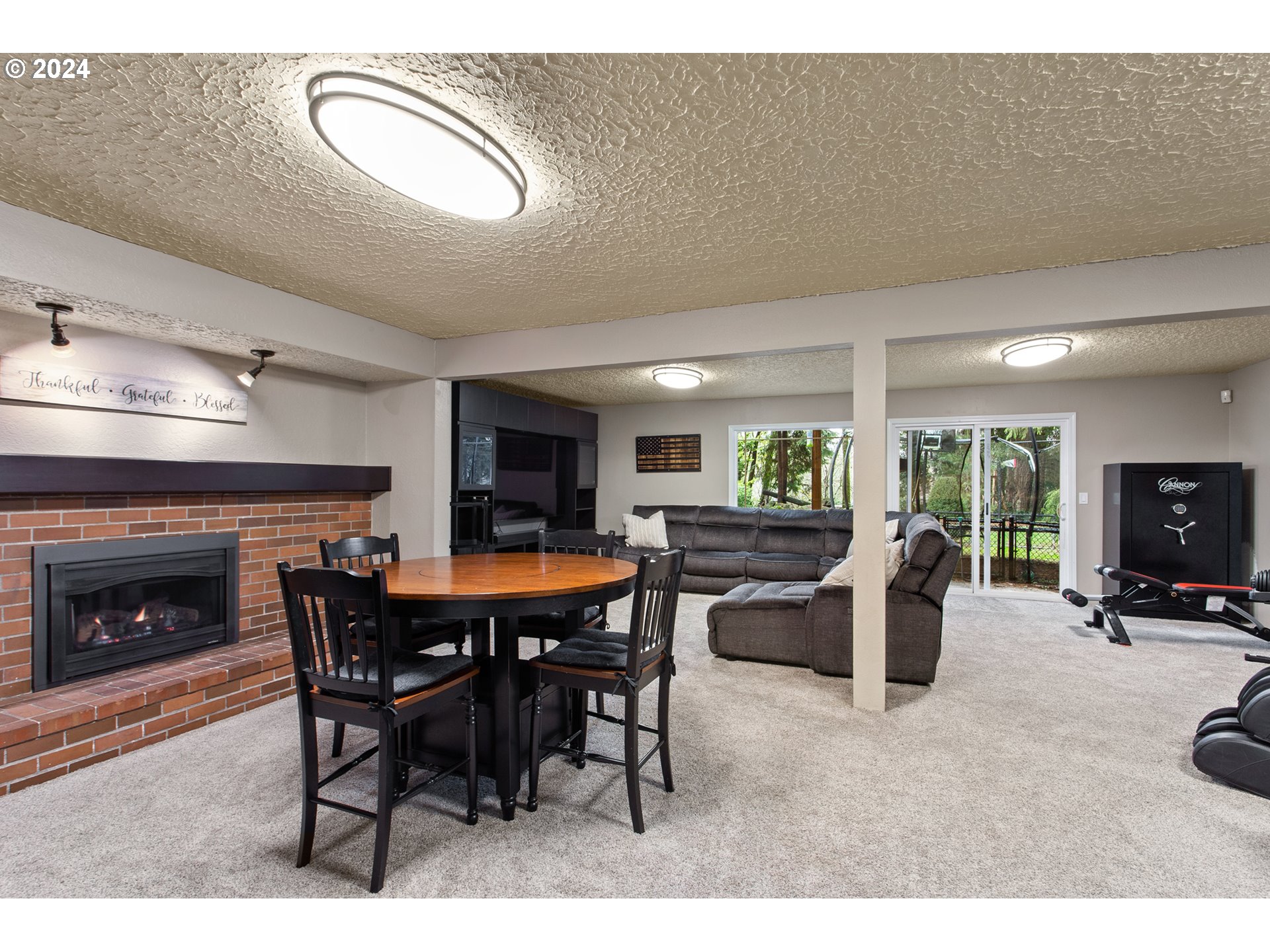 3308 Northwest 203rd Street Ridgefield, WA 98642 - Photo 22 of 41 a view of a dining room with furniture window and outside view