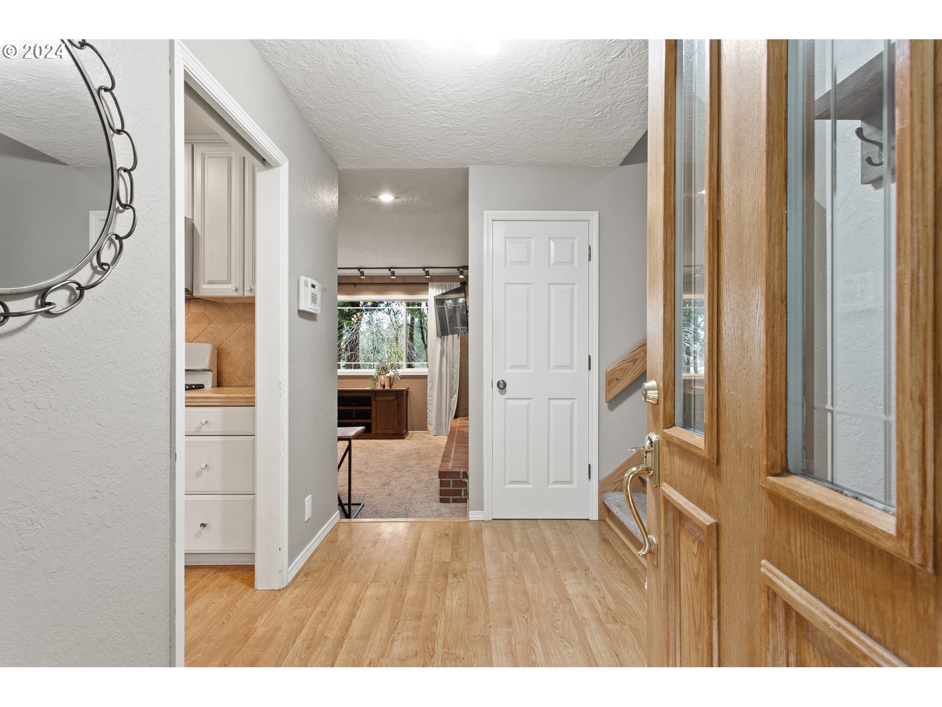 3308 Northwest 203rd Street Ridgefield, WA 98642 - Photo 34 of 41 a open hall with wooden floor and windows