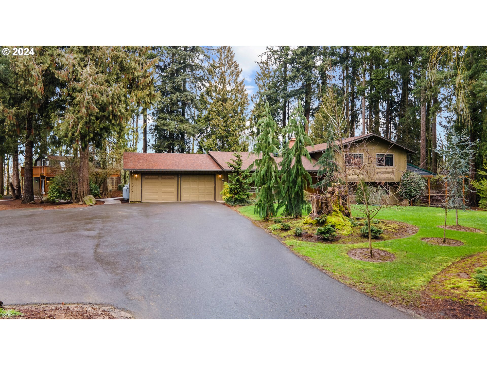 3308 Northwest 203rd Street Ridgefield, WA 98642 - Photo 5 of 41 a black and white photo of a house