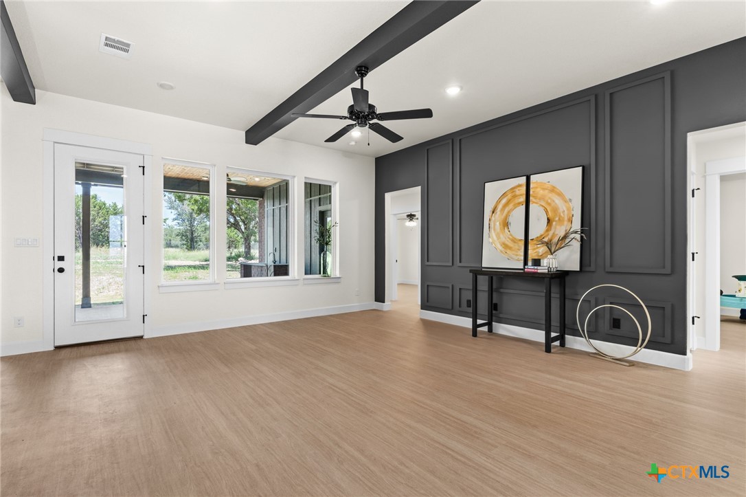 3025 Millhouse Road Copperas Cove, TX 76522 - Photo 3 of 38 a view of an entryway with wooden floor