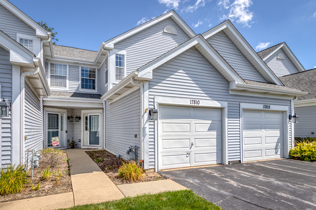 17810 Braewick Road Gurnee, IL 60031 - Photo 1 of 1 a front view of a house with a garage