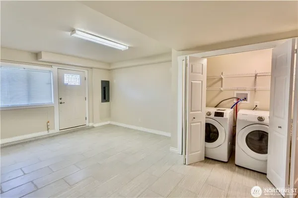 a utility room with dryer and washer