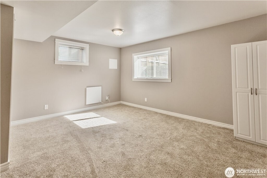 2241 South 252nd Street Des Moines, WA 98198 - Photo 19 of 25 a view of empty room with windows