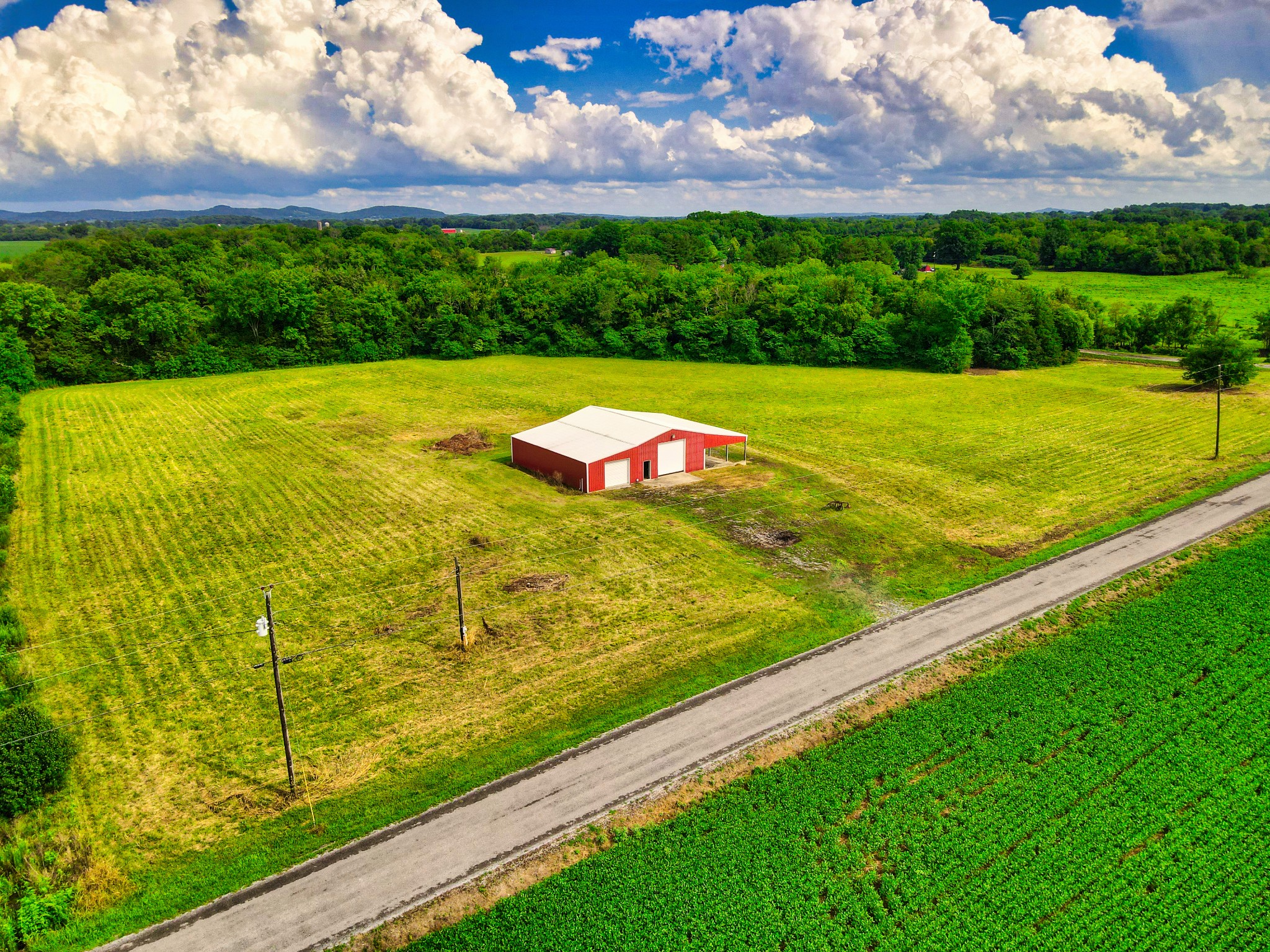 108 County Line Road Bell Buckle, TN 37020 - Photo 1 of 22 a view of an outdoor space and a lake view