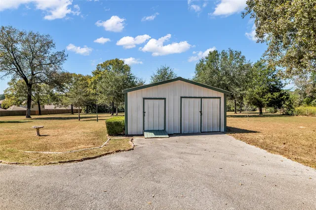 a view of swimming pool with a yard