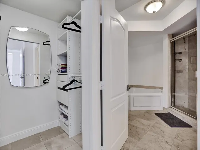 a view of a balcony with chairs