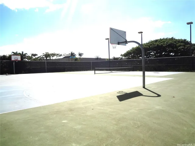 a bathroom with a bathtub and trees
