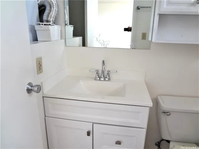 a bathroom with a sink and a toilet