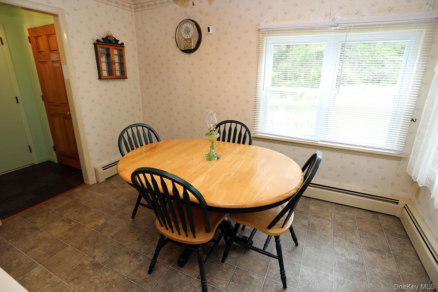 9568 Highway 97 Callicoon, NY 12723 - Photo 12 of 50 a view of a dining room with furniture and window