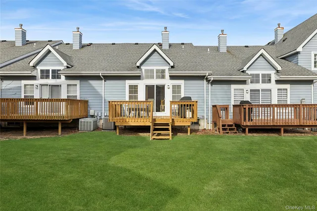 a view of front of house with a yard