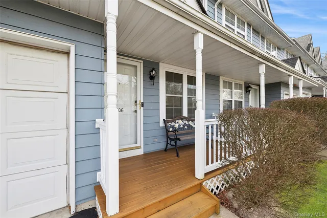 view of living room and wooden door
