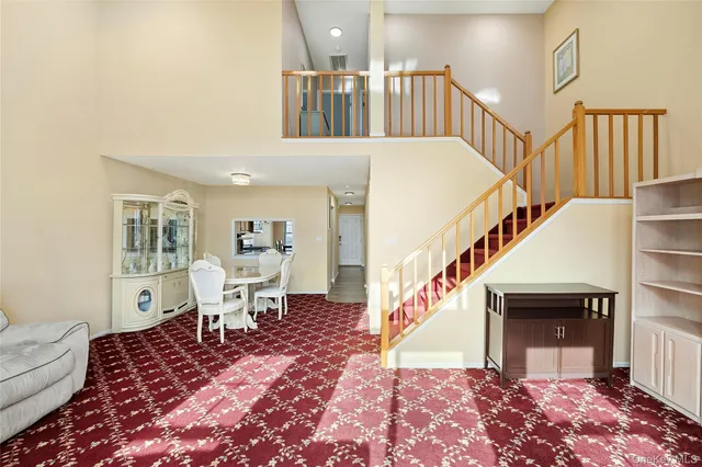 a living room with stairs