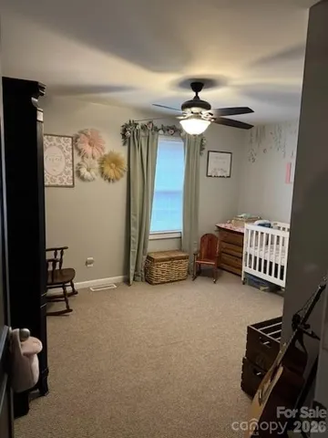 a room with furniture and mirror