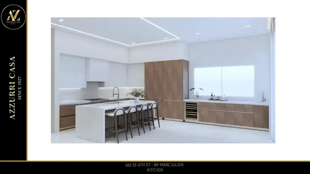 a kitchen with a sink a counter top space and stainless steel appliances