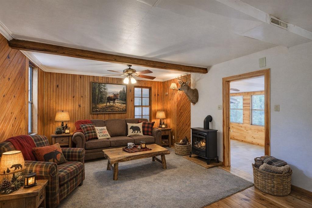 1267 Johnson Road Doyline, LA 71023 - Photo 3 of 19 a living room with furniture and a fireplace