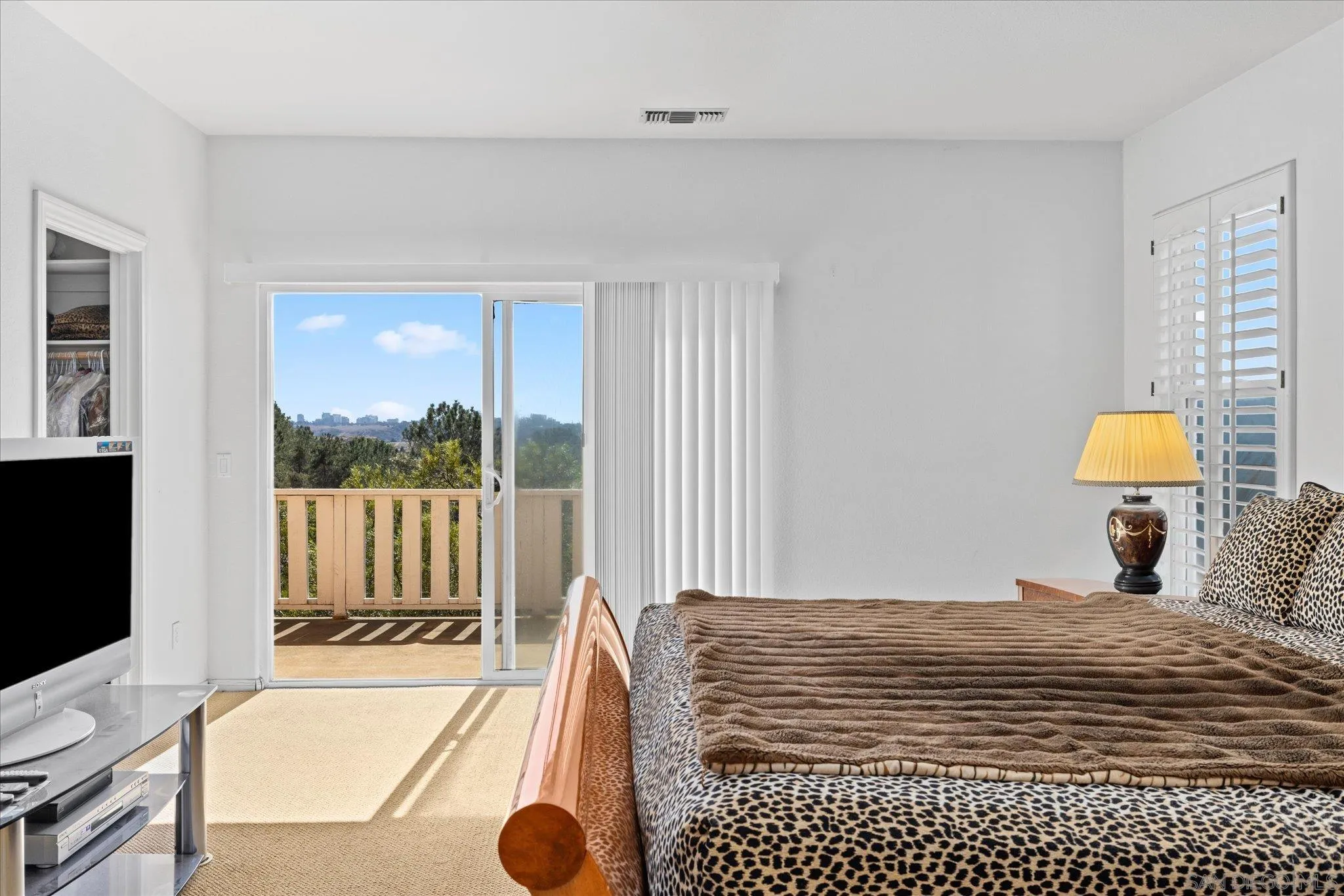 3971 Via Cangrejo San Diego, CA 92130 - Photo 11 of 26 a bedroom with a bed and a window