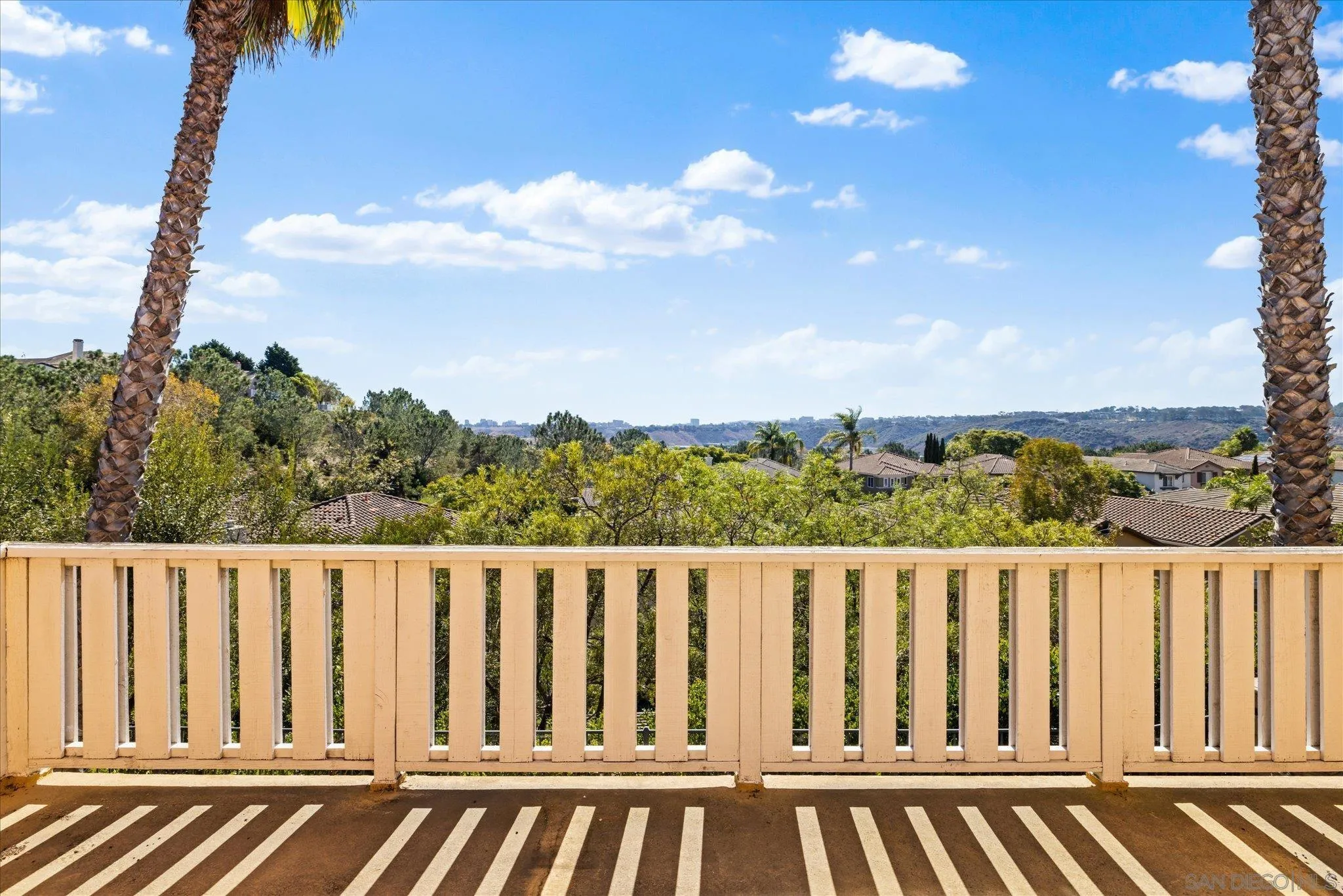 3971 Via Cangrejo San Diego, CA 92130 - Photo 12 of 26 a view of a street with a car parked