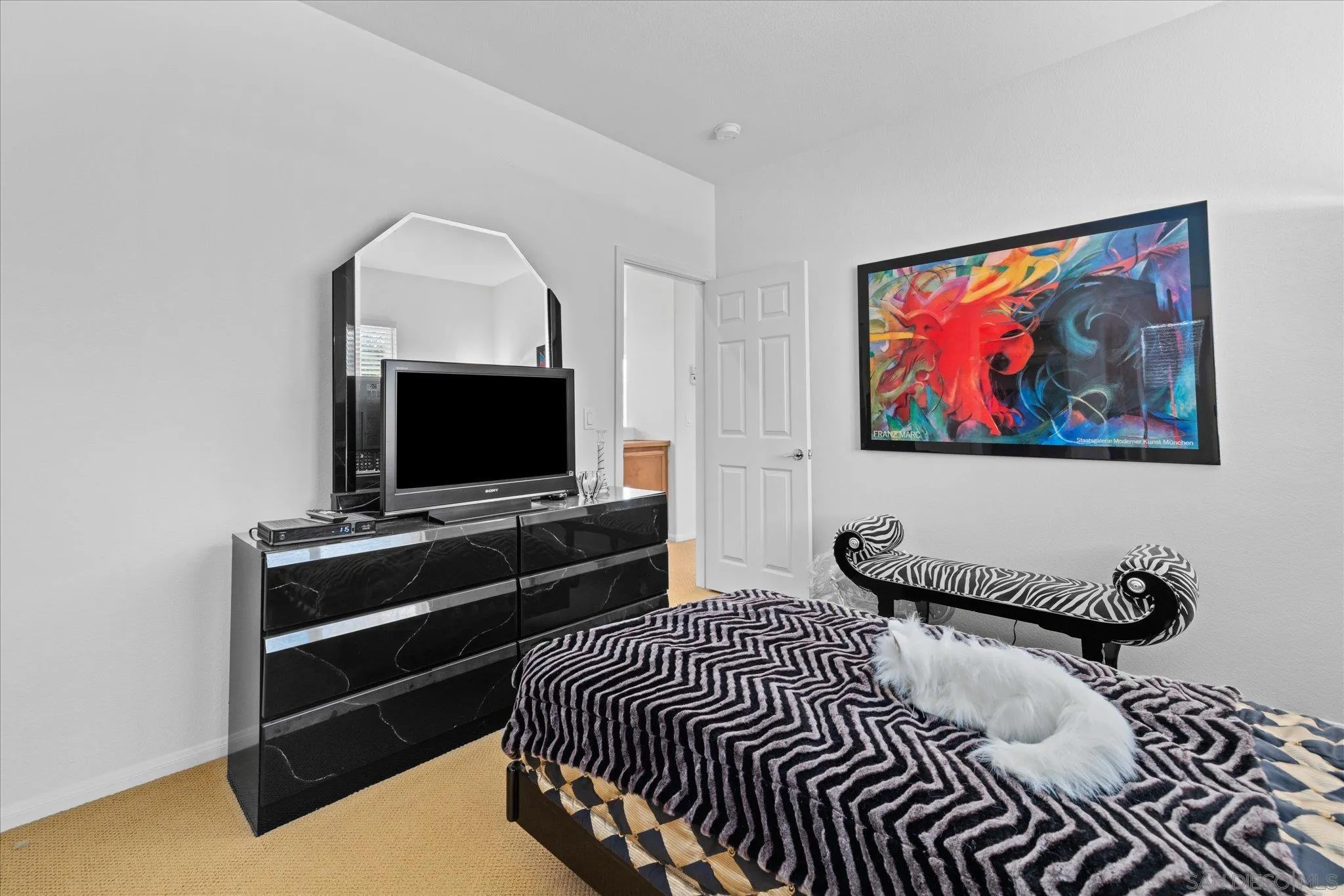 3971 Via Cangrejo San Diego, CA 92130 - Photo 18 of 26 a living room with furniture and a flat screen tv