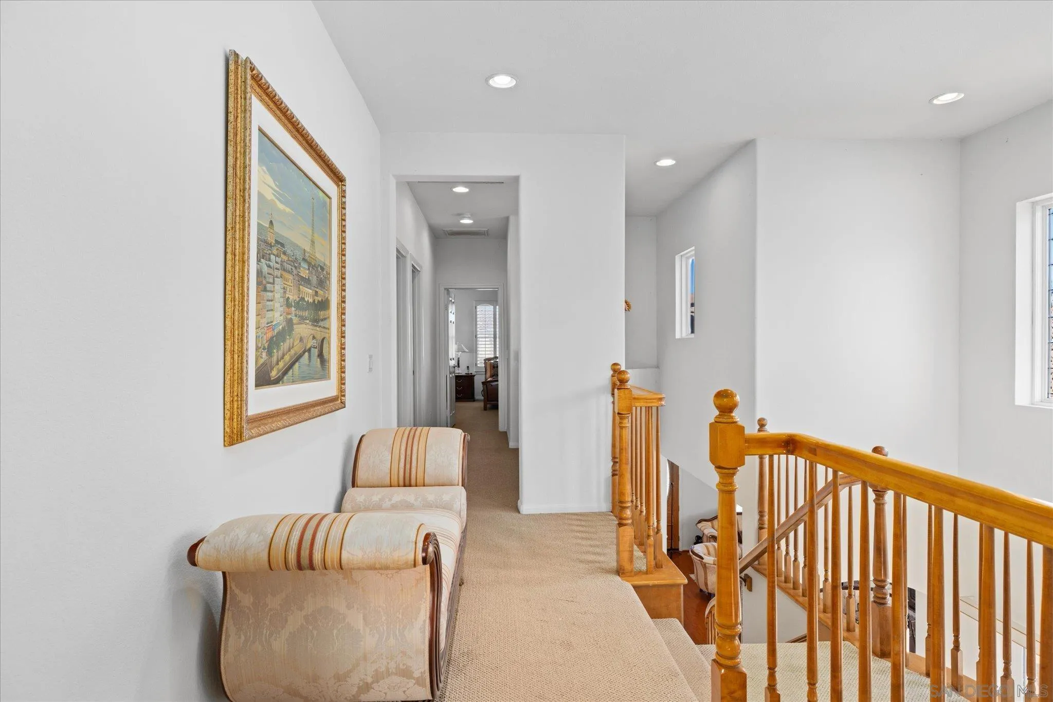 3971 Via Cangrejo San Diego, CA 92130 - Photo 21 of 26 a living room with furniture and a window