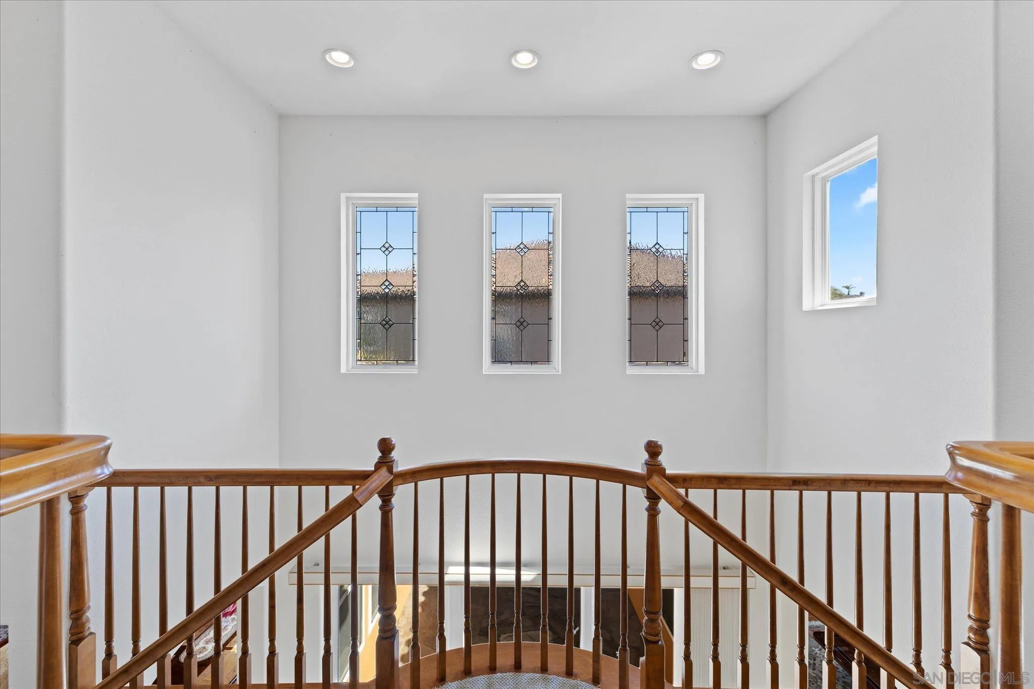 3971 Via Cangrejo San Diego, CA 92130 - Photo 22 of 26 a view of hallway with a window