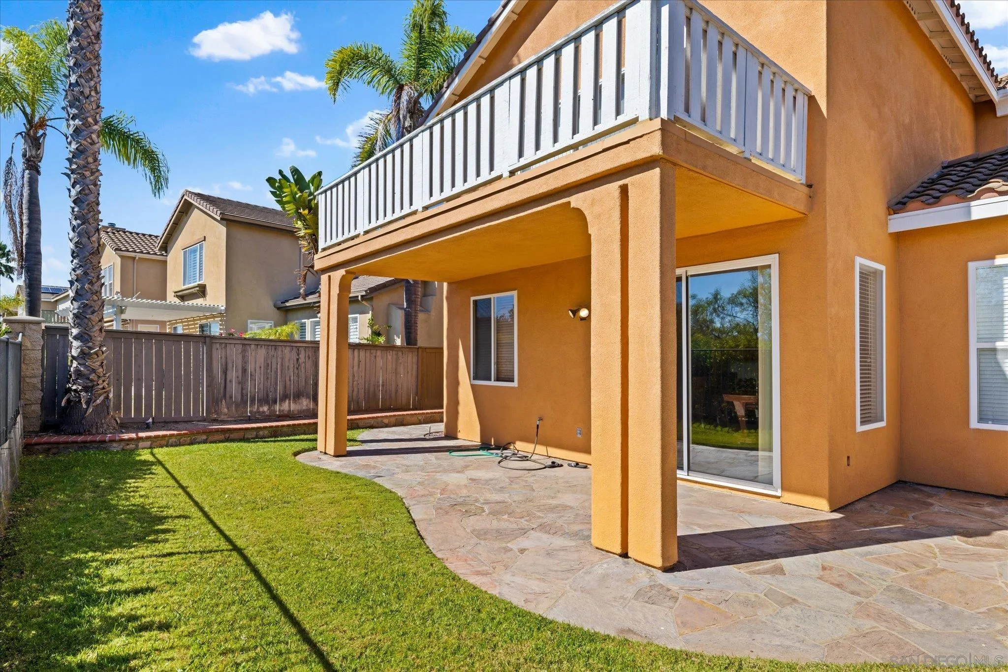 3971 Via Cangrejo San Diego, CA 92130 - Photo 25 of 26 a view of a house with a yard